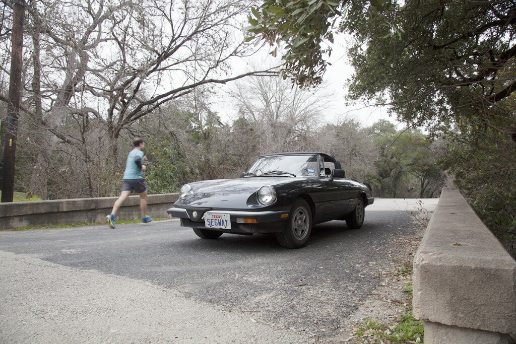 Monroe's old car crosses his Forever Bridge. Photo by Ave Bonar.