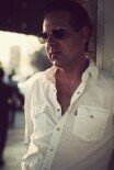 Mike Flanigin, 50, began his career as a guitarist.
